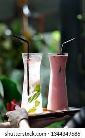 Serving Strawberry Yogurt Smoothie And Itlian Soda Or Lemon Juice