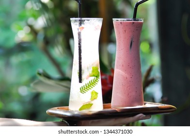 Serving Strawberry Yogurt Smoothie And Itlian Soda Or Lemon Juice