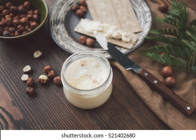Serving table for breakfast: crispy bread and nut butter. - Shutterstock ID 521402680
