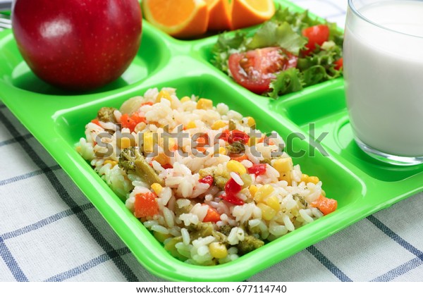 Serving tray with delicious food, closeup. Concept\
of school lunch