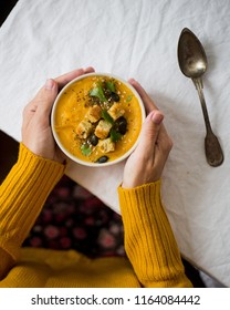 Serving Vegetable Soup In A White Bowl