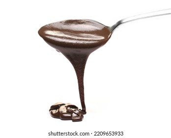Sesame Butter Dripping With Cocoa, Tahini Paste In Spoon Isolated On White  