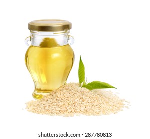 Sesame Oil With Seeds. Isolated On White Background.