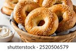 Sesame Seed Bagels: Chewy and golden, these bagels are sprinkled with nutty sesame seeds, perfect for spreading cream cheese or topping with smoked salmon for a delightful breakfast.