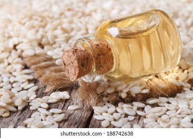 Sesame Seed Oil In Glass Bottle On The Table Closeup Horizontal 