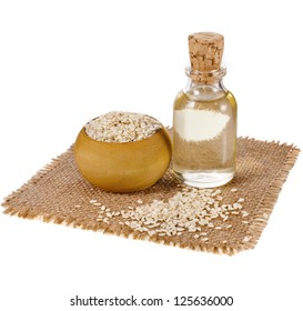 Sesame Seeds And Glass Oil Isolated On White Background