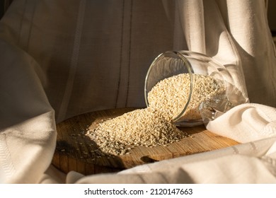 
Sesame Seeds On Wood Chopper With White Cloth