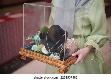 Seserahan item or wedding gift acrylic box from the bridegroom to the bride, Jewelry Gold Necklace Ring bracelet - Shutterstock ID 2251537585