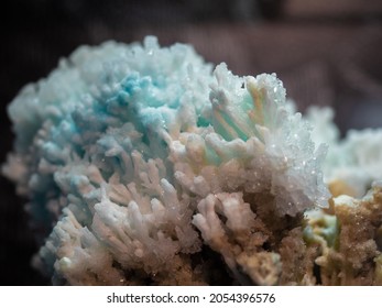 Session of precious minerals and rocks. Macro photo of Calcite with secondary of CU. Rocks and minerals exhibited in a museum. Gemstones, rocks and jewelry minerals. Reflections and textures of colorf