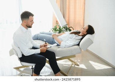 session with psychotherapist, woman with depression solves mental difficulties and talks about problems to male psychologist. mental health. treatment of nervous and mental disorders. anxiety.