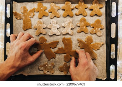 Set 21. Men's hands knead the dough. The chef prepares ginger. Christmas cookies on the table with cooking flour.