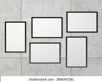 Set of 5, 3 horizontal and 2 vertical black frames hang on concrete wall. Mock-up and Template for art, design, photography, illustration and painting. 