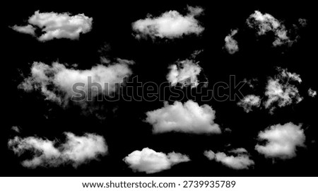 Set an abstract white fluffy cloud on an isolated black background. floating softly with a light texture, blending with smoke in the sky, for design use. cloud transparent in nature