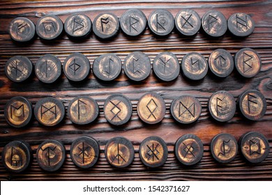 Set of anglo-saxon runes carved in wood - anglo-saxon futhark (futhorc)