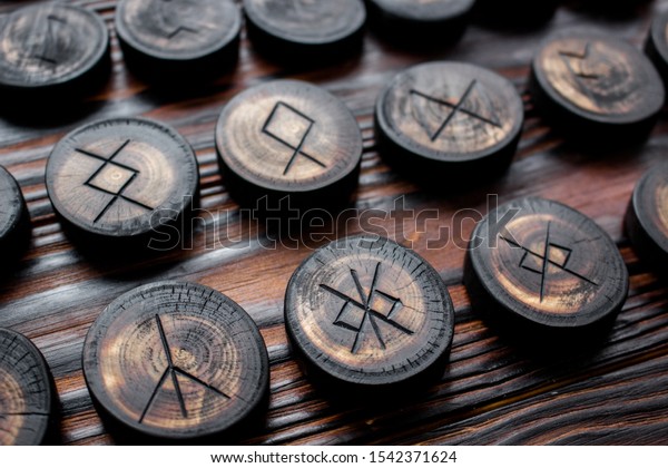 Set of anglo-saxon runes carved in wood -\
anglo-saxon futhark\
(futhorc)