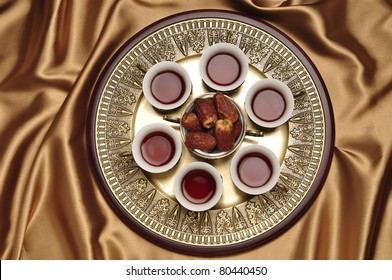 A Set Of Arabic Tea Cups With Dates.