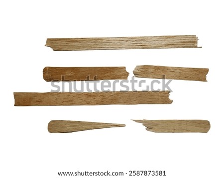 A set of assorted wooden splinters showcasing natural textures and irregular shapes against a plain white backdrop, perfect for crafts, woodworking, or design elements.