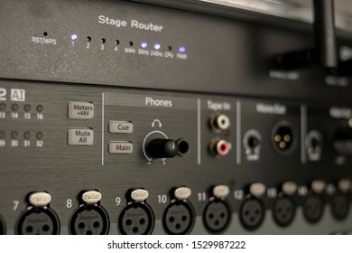 Set Of Audio Inputs On A Stage Mixer With Headphone Output, Phantom Power Buttons And Stage Router Status LEDs