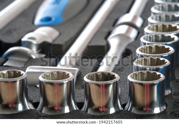 A set of auto mechanic tools. Tools: head crank,\
ratchet, imbus keys