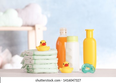 Set With Baby Accessories On Table Indoors