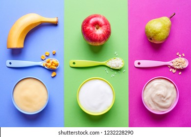 Set of baby food. Porridge for babies on blue, green and pink background, top view - Powered by Shutterstock