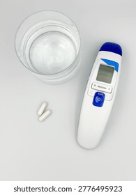 A set of basic necessities for colds on a white background. Top view.