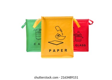 A set of baskets for manual separation of garbage into paper, cans and plastic on a white background. Colored bags for separate garbage collection. - Shutterstock ID 2163489151