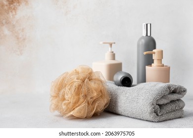 Set Of Bath Accessories And Soft Sponge On Light Background