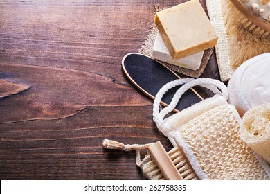 set of bath items on vintage wooden boards with organized copyspace