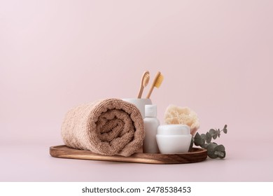 Set of bath and self care products for bathroom, spa and wellness. Body care still life with cotton towel, soap, serum bottle and bamboo toothbrushes. - Powered by Shutterstock