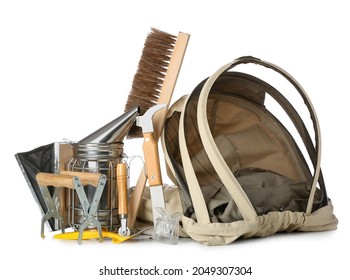 Set of beekeeping supplies on white background