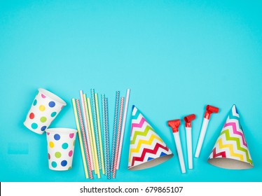 Set Of Birthday Party Items On Light Blue Surface View From Above