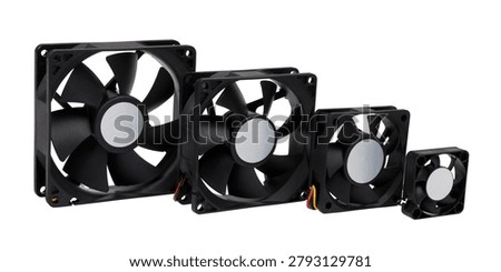 Set of black computer cooling fans of different sizes arranged in a row, electronic components for PC case ventilation and CPU heat dissipation, plastic frame fans with rotor blades for computer hardware and server cooling systems, technical equipment for desktop and industrial electronics, isolated on white background, group of cooling devices comparison view