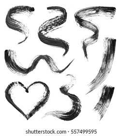 Set of black mascara strokes isolated on white background