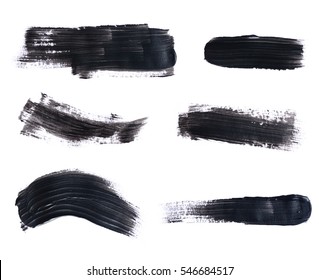 Set of black paint strokes isolated on white background.