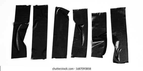 Set of black tapes on white background. Torn horizontal and different size sticky tape, adhesive pieces.