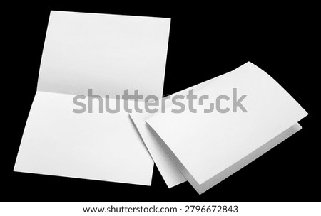Set of blank folded paper sheets, isolated on black background