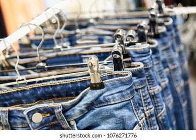 Set Blue Jeans Hanging On Hangers Stock Photo 1076271776 | Shutterstock