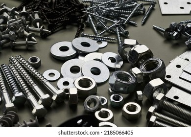 Set of bolts nuts nails metal fasteners. Consumable hardware tools. assortment steel screws collection close up background - Shutterstock ID 2185066405