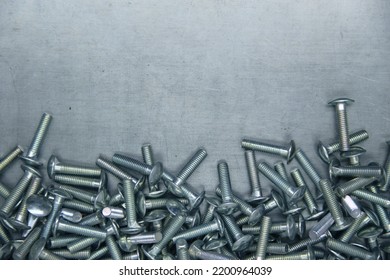 A Set Of Bolts On A Steel Plate Background. Locksmith Business.