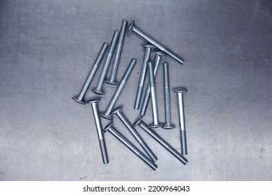 A Set Of Bolts On A Steel Plate Background. Locksmith Business.