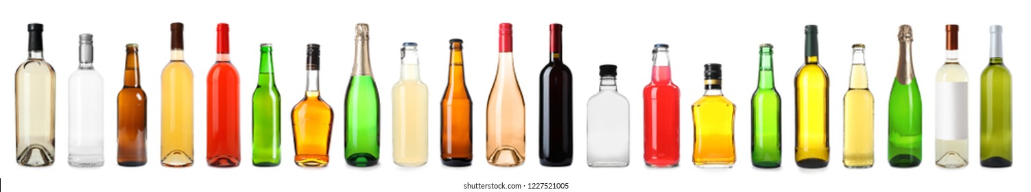 Set of bottles with different drinks on white background