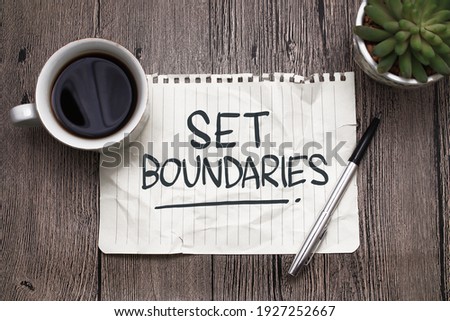 Set boundaries, text words typography written on paper against wooden background, life and business motivational inspirational concept
