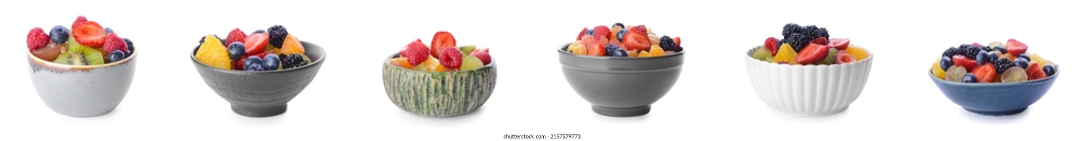 Set of bowls with tasty fruit salads on white background - Shutterstock ID 2157579773