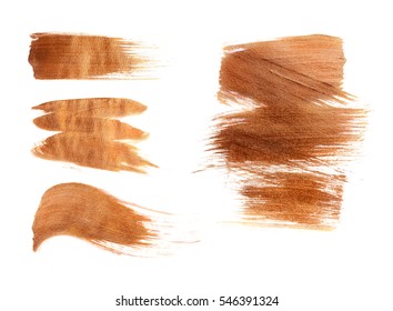 Set Of Bronze Paint Strokes Isolated On White Background