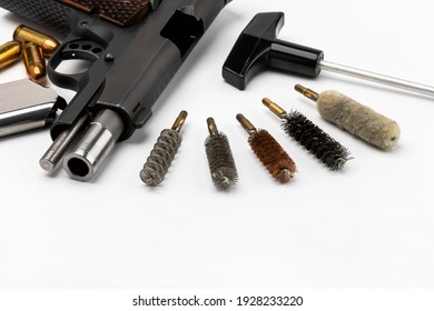 Set Of Brush Cleaning Bore Of Pistol Handgun On White Background , Gun Maintenance