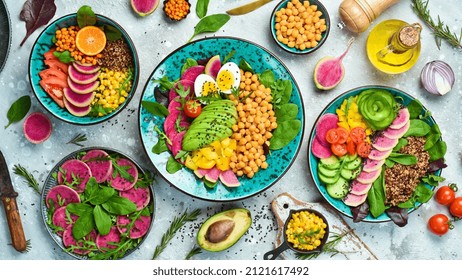 Set Buddha Bowl. Clean And Balanced Healthy Food Concept. Quinoa, Chickpeas, Avocado, Fresh Vegetables And Nutritious Food, Halthy Eating, Dieting Food Concept On A Stone Background.