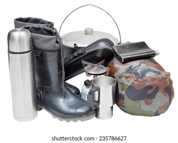 set of camping belongings with gumboots, pot, thermos, flask, can, sleeping bag, gas burner isolated on white background - Shutterstock ID 235786627