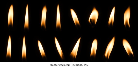 Set of candle flames on black background Melted wax candles that burn at night white candle burning in dark candlelight