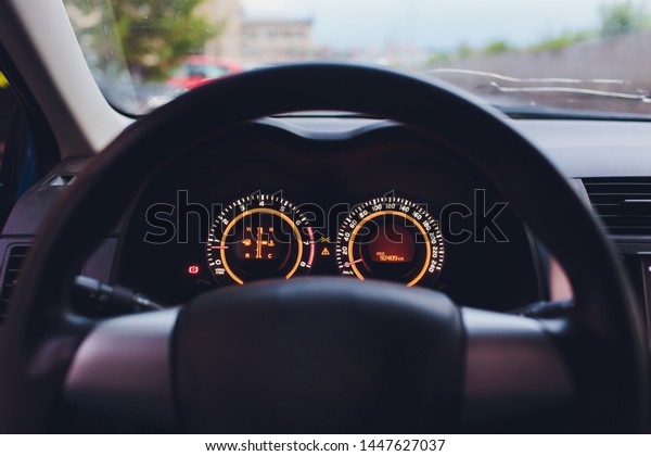 Set of car dash boards\
petrol meter, fuel gauge, on black background concept warning\
checking oil.